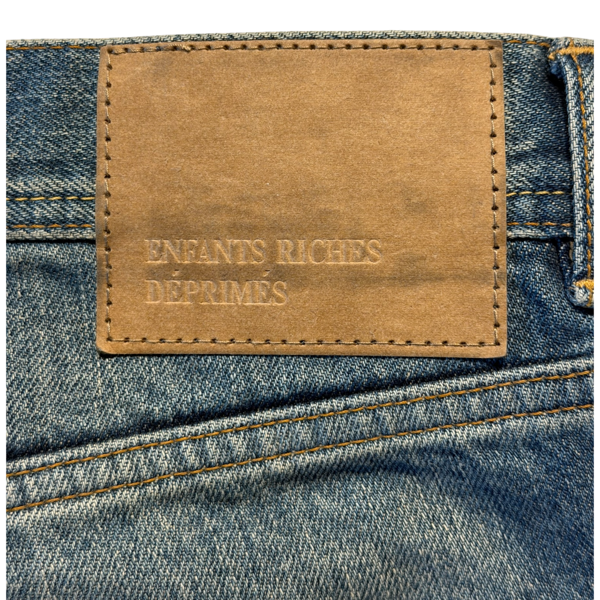 Logo Patch Distressed Denim Jeans