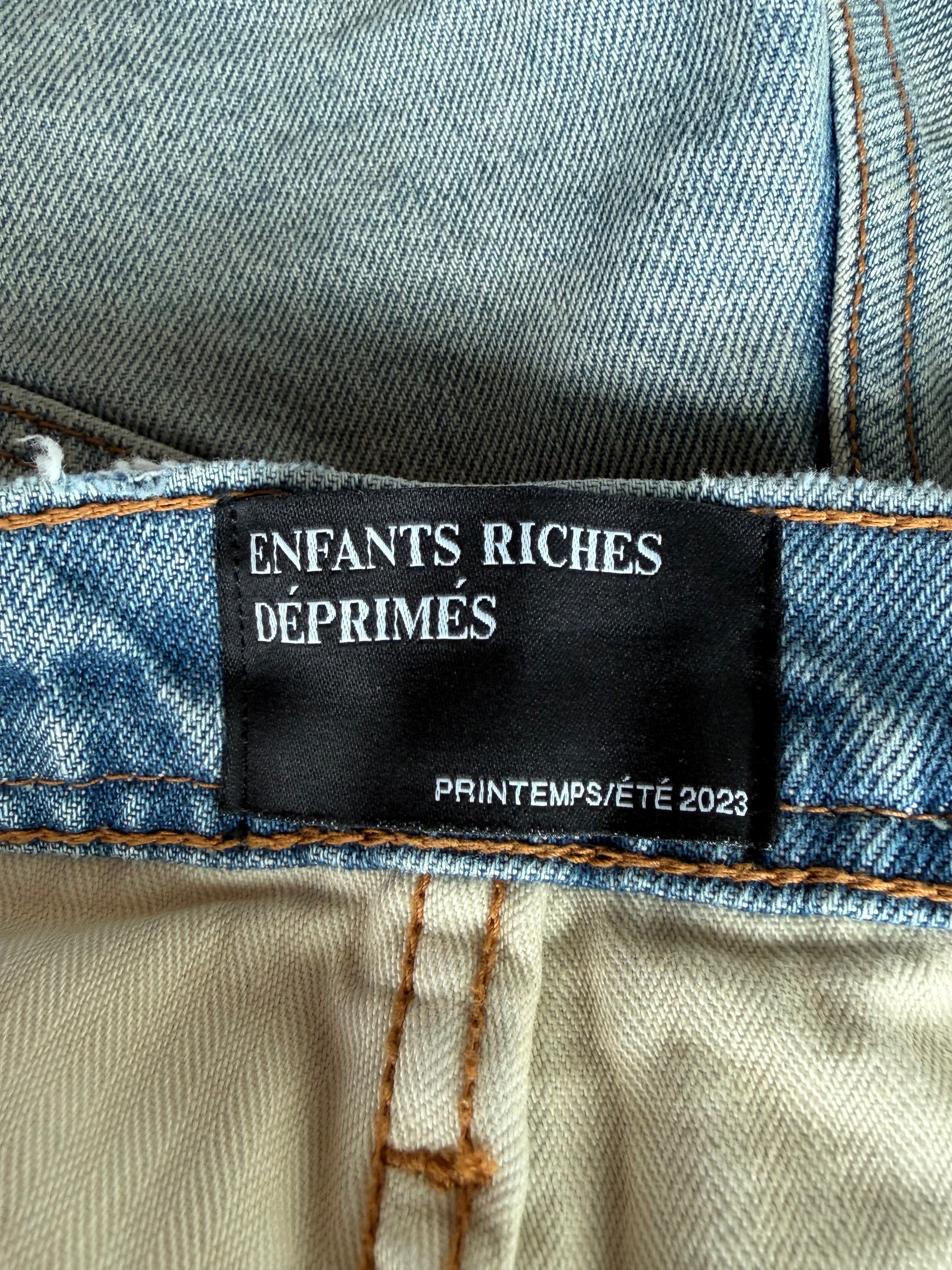 Blue Distressed Flared Jeans